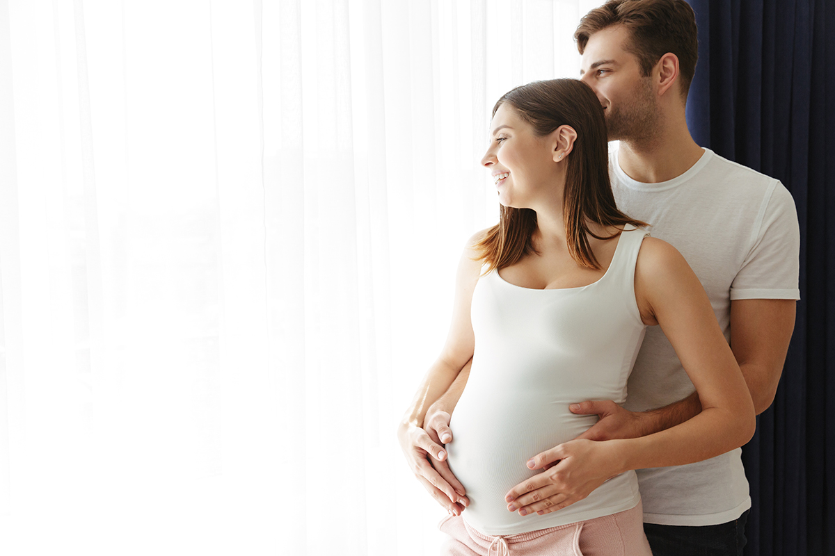 happy-man-hug-his-lovely-pregnant-wife-indoors-home.jpg